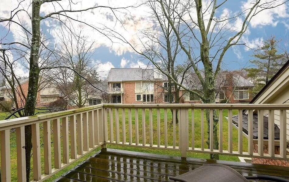 A Building With A Wooden Fence