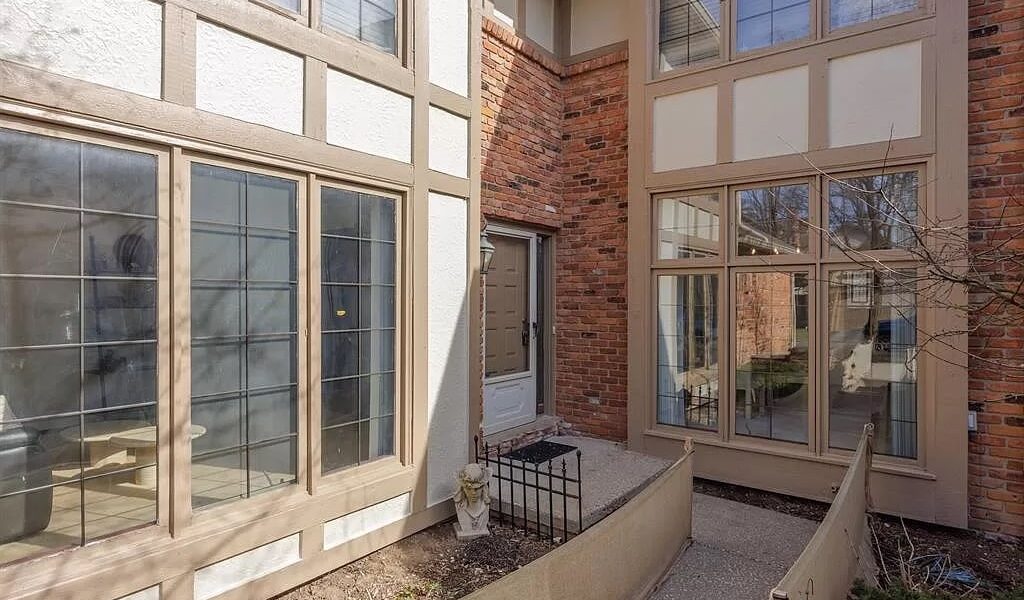 A Large Brick Building With A Window