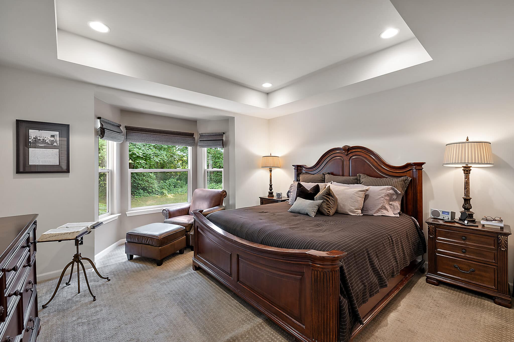 a living room filled with furniture and a bed