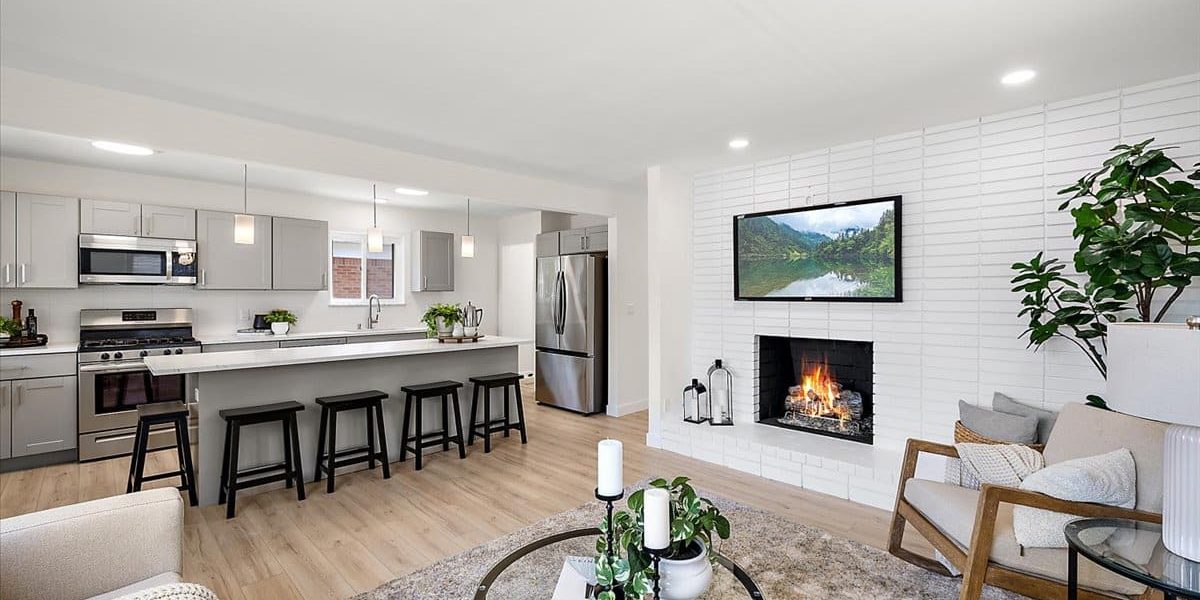 A Living Room Filled With Furniture And A Fire Place