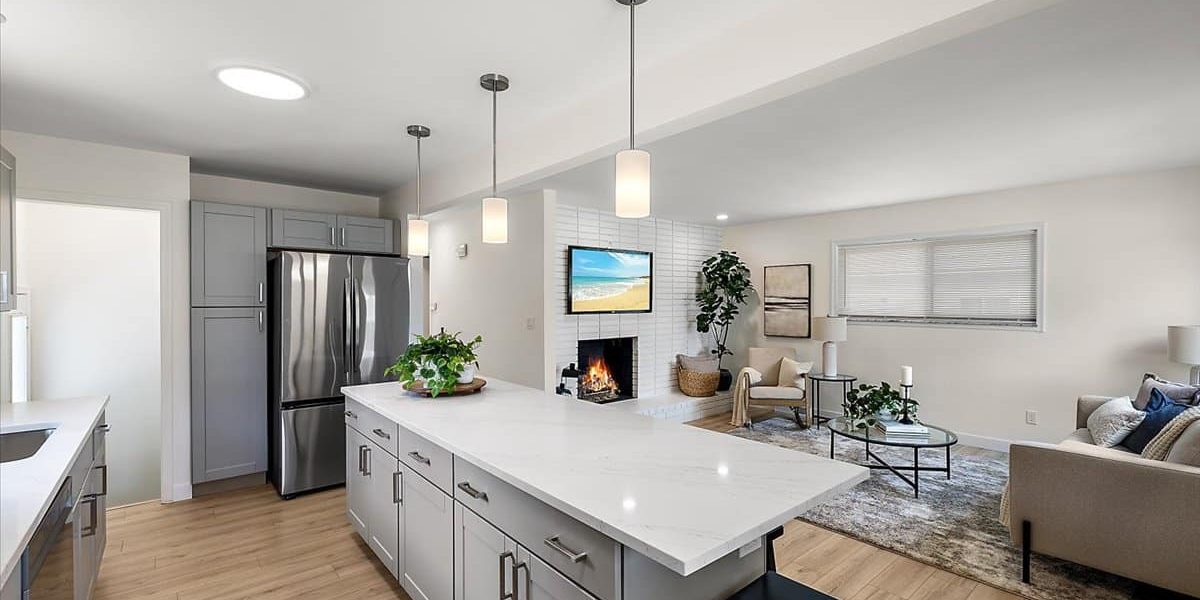 A Modern Kitchen With Stainless Steel Appliances