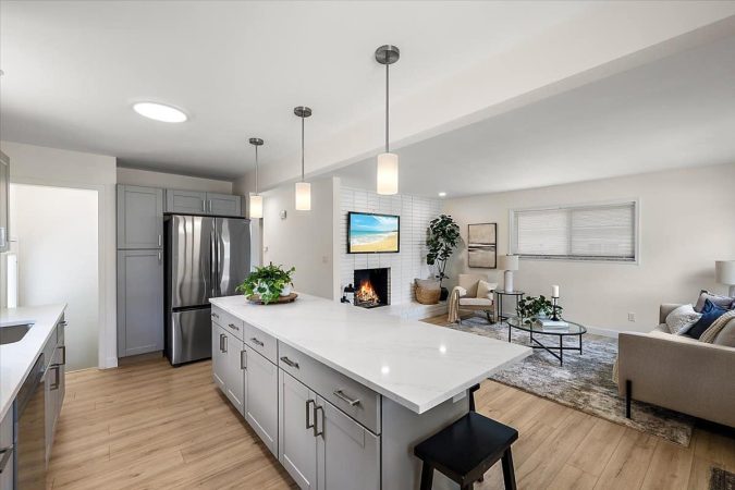 A Modern Kitchen With Stainless Steel Appliances
