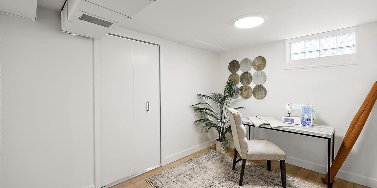 A Room Filled With Furniture And A Large Window