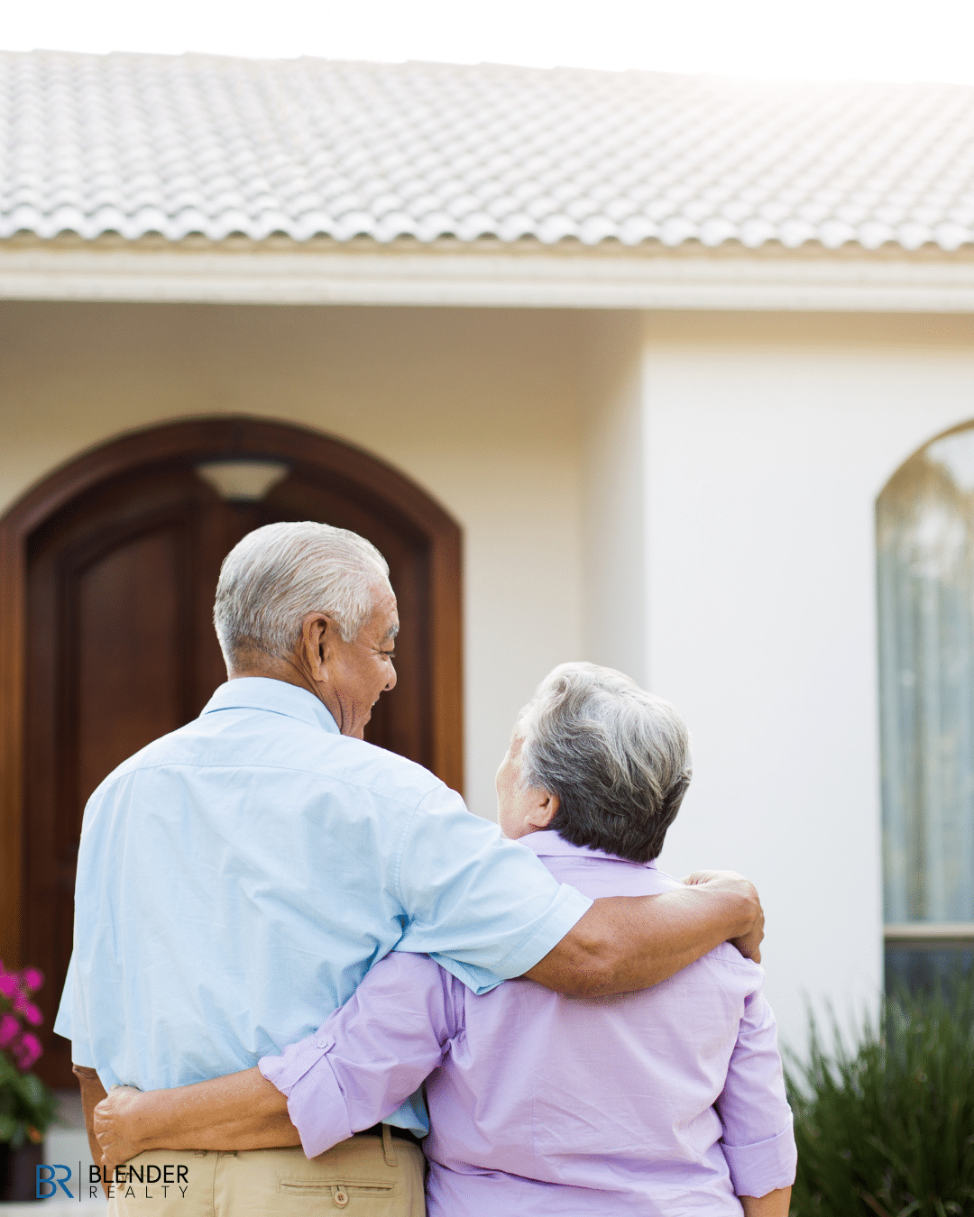 older couple looking at house